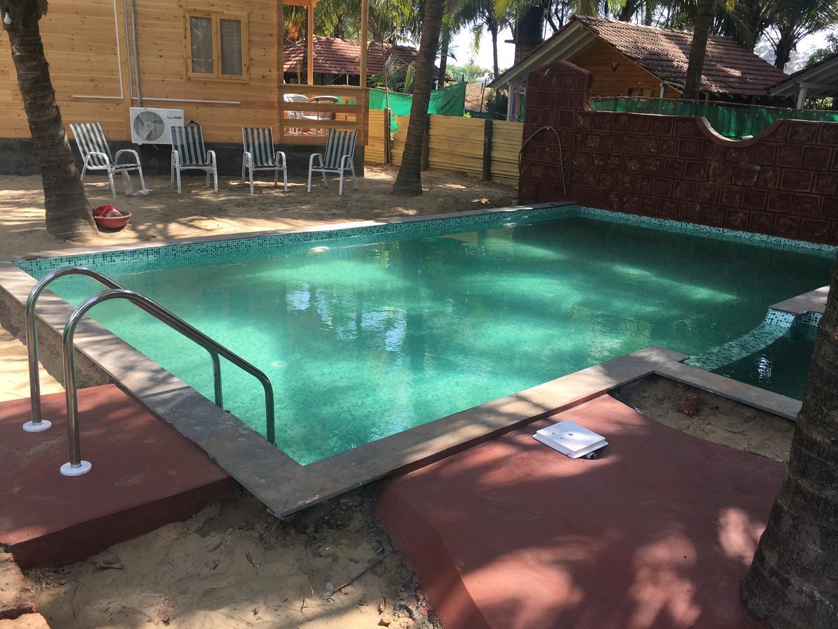 Tiara Fiesta Beach Cottages Morjim Dış mekan fotoğraf